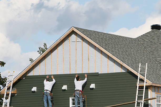 Professional Emergency Siding Repair technician working in Uniontown, OH